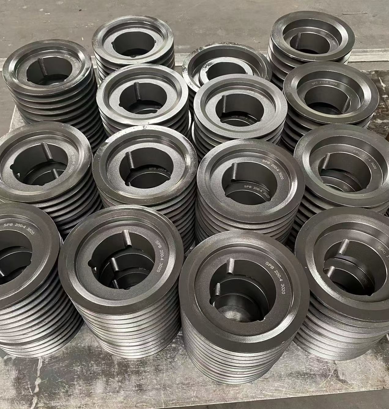 Batch of SPB cast iron taper lock pulleys, multiple sizes heavy duty V belt pulleys for cement plant power transmission Batch of SPB cast iron taper lock pulleys, multiple sizes heavy duty V belt pulleys for cement plant power transmission
