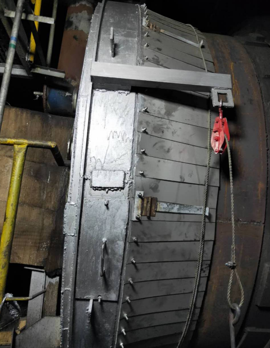 Rotary kiln head fish scale seal assembly installed on cement rotary kiln discharge end Rotary kiln head fish scale seal assembly installed on cement rotary kiln discharge end